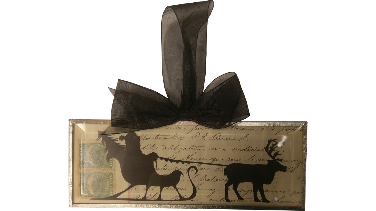 Hand-cut silhouette ornament